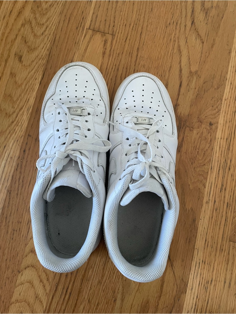 White Nike Air Force 1 sneakers